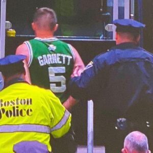 fan arrested for throwing water bottle at kyrie
