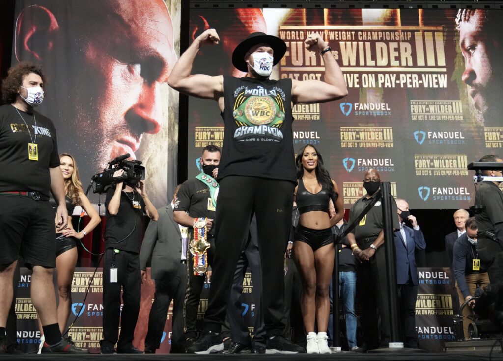 Fury keeps shirt at weigh in